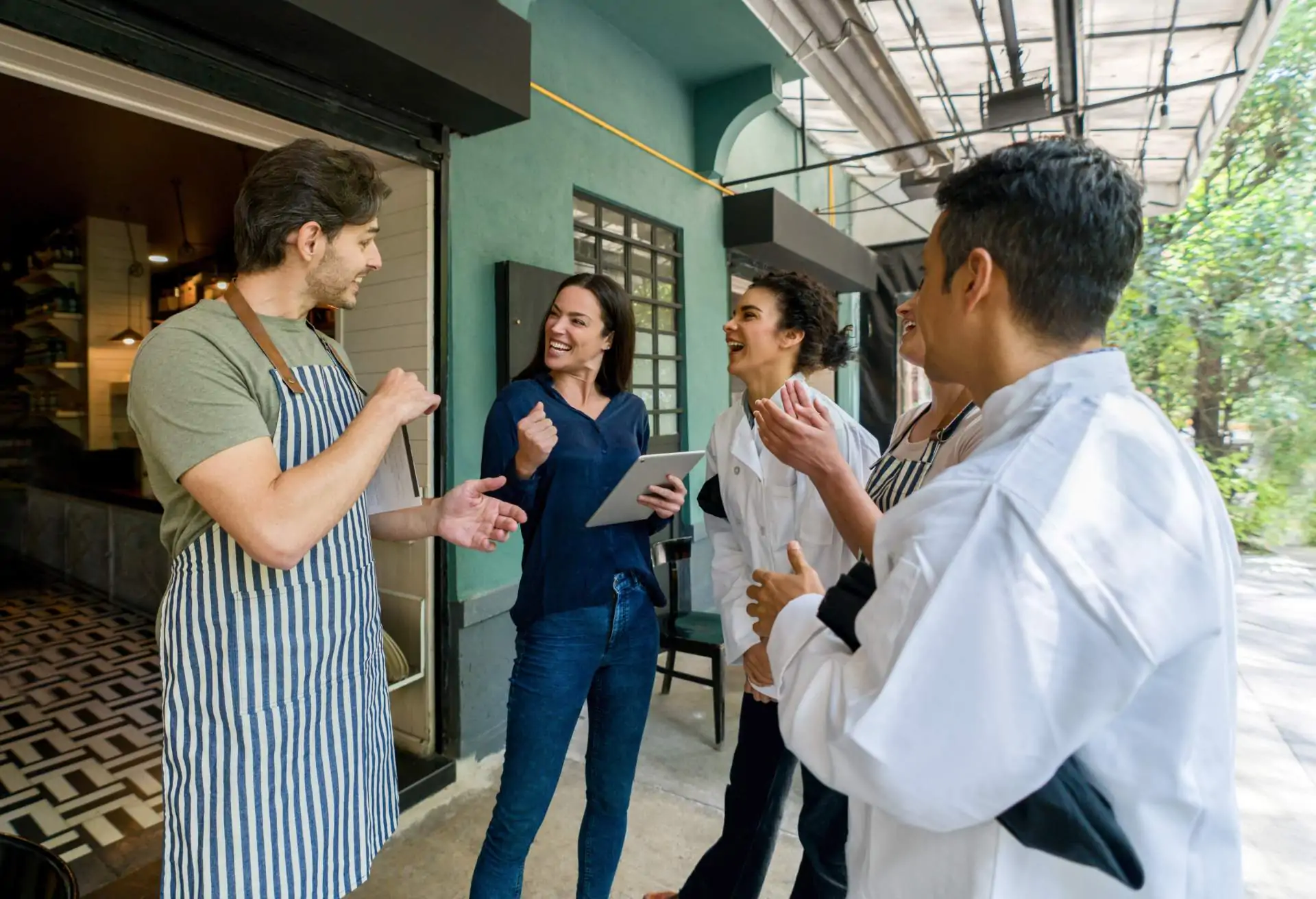 Restaurant staff having a meeting