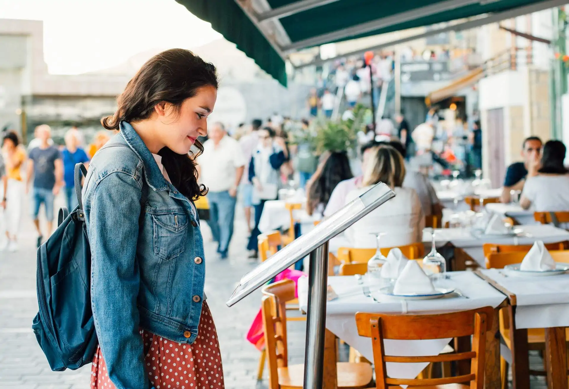 traveller-looking-at-restaurant-menu